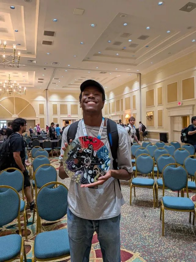 Holding the HackspaceCon Black Badge
