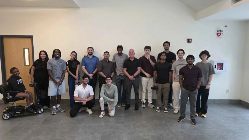 NCCI's security team and their intern visiting the club, with Wade